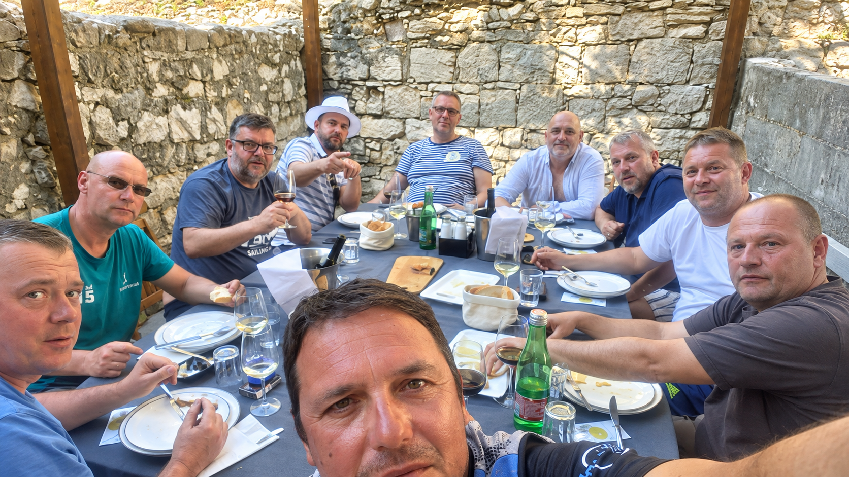 Sailing group sharing dinner at an island restaurant