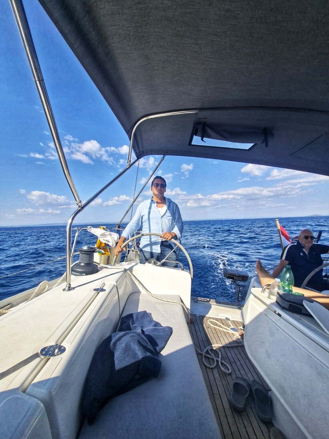 Experienced local skipper sailing in the Adriatic
