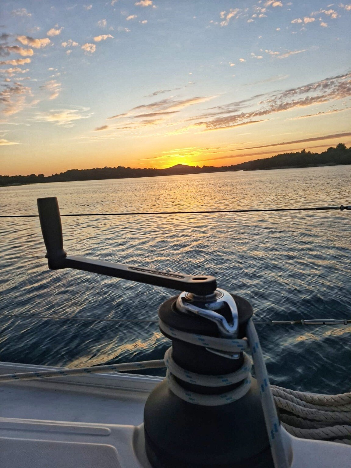 Sailing winch at sunset near Murter